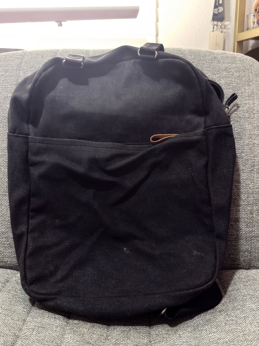QWSTION designed & developed Zurich in Black Canvas Backpack